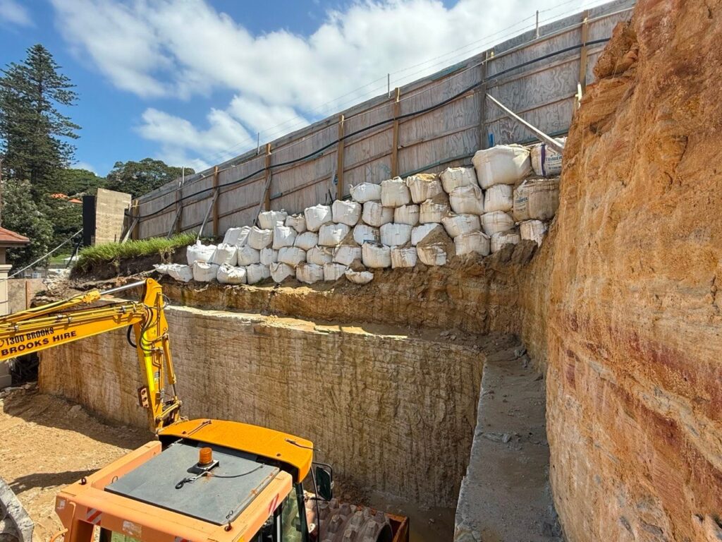 Excavation with boulder retaining wall at Bronte Surf Life Saving Club, NSW